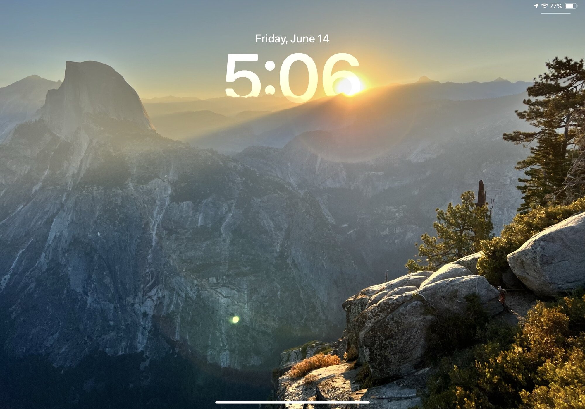 One example of Jeff’s iPad Pro lock screen showing a new landscape photo every hour.