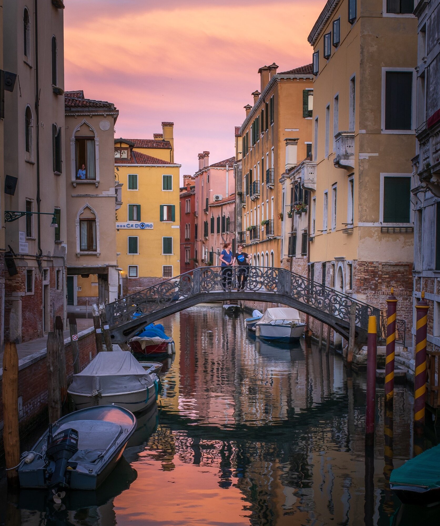 Jeff’s family over a canal in Venice, captured using the fixed-lens Fujifilm X100V. (Photo: Jeff Carlson)