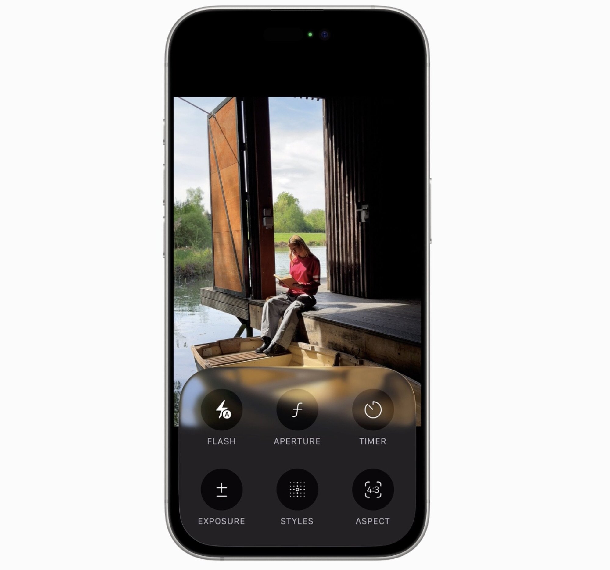 Bringing up shooting settings in the glassy screen. (Apple)