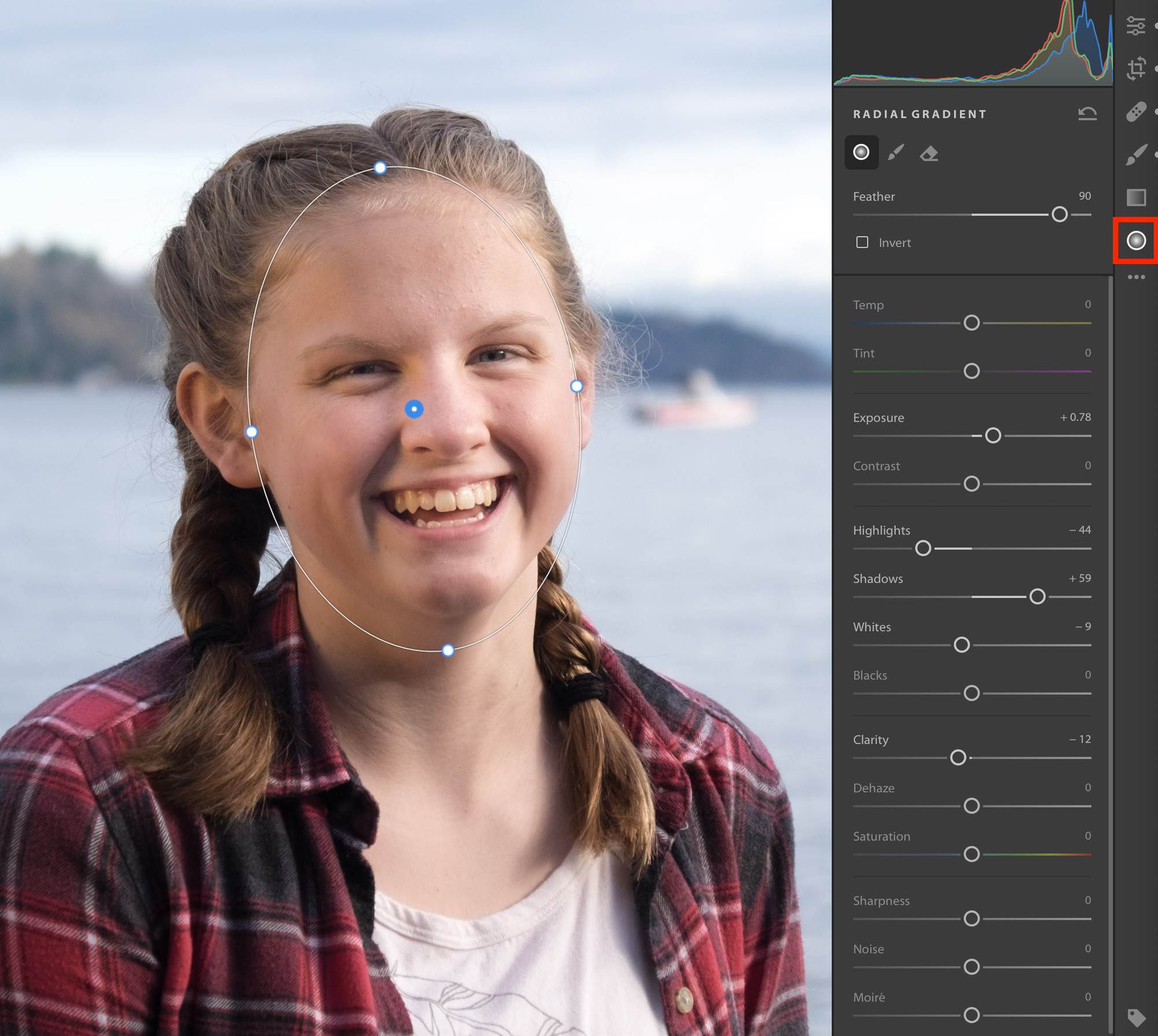 This Radial gradient increases the exposure and the shadows to add some fill light to her face without affecting the rest of the image. And because it's a gradient, the light increases feathers around the middle of the oval to blend in.