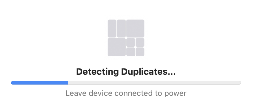 The mysterious “Detecting Duplicates” message at the bottom of Photos as it’s scanning the photo library following the upgrade to macOS Catalina. Is this a new feature to come?